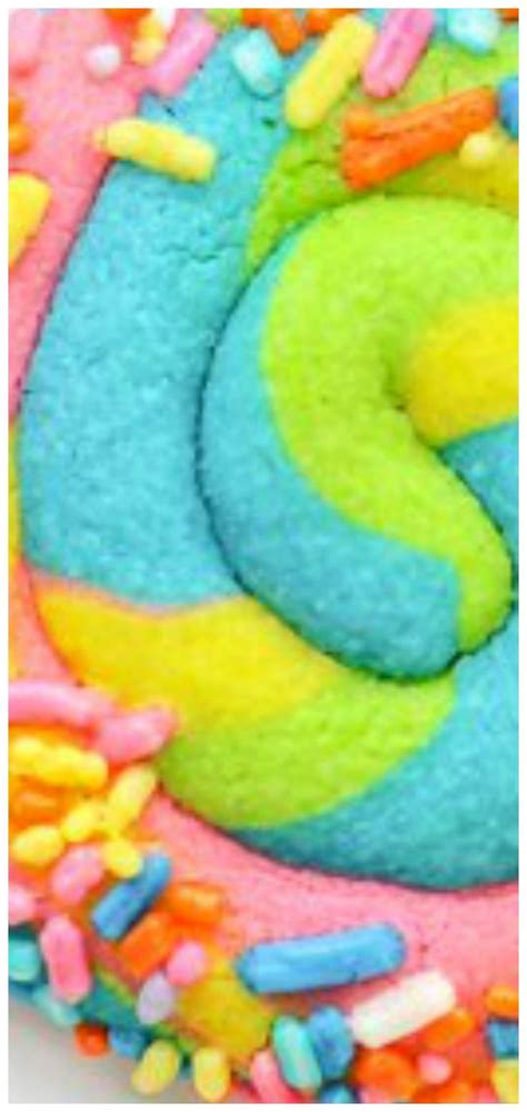 There Is A Colorful Cake With Sprinkles On It