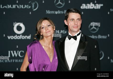 British actor Matthew Goode right and his partner arrive for the ...