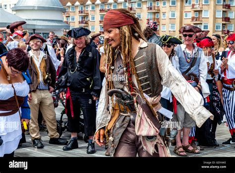 People Dressed In Pirate Costumes On Hastings Pier During The Annual ...