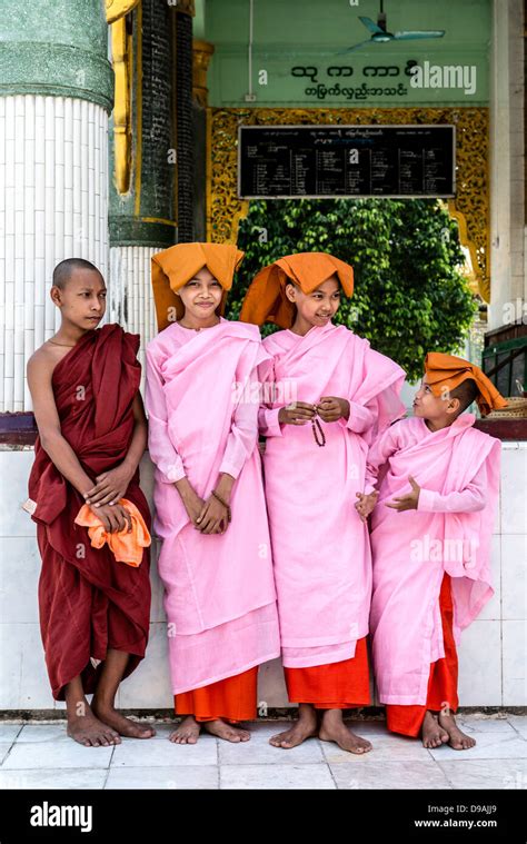 Young Buddhist Nuns And Monk At Shwedagon Pagoda Or Great Dagon Pagoda Or Golden Pagoda Yangon