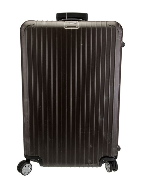 Rimowa Plastic Rolling Suitcase Green Luggage And Travel Handbags