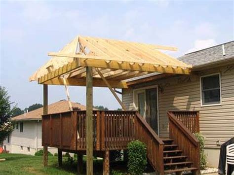 How To Build A Roof Over A Deck Hunker Building Roof Building A Deck Diy Deck