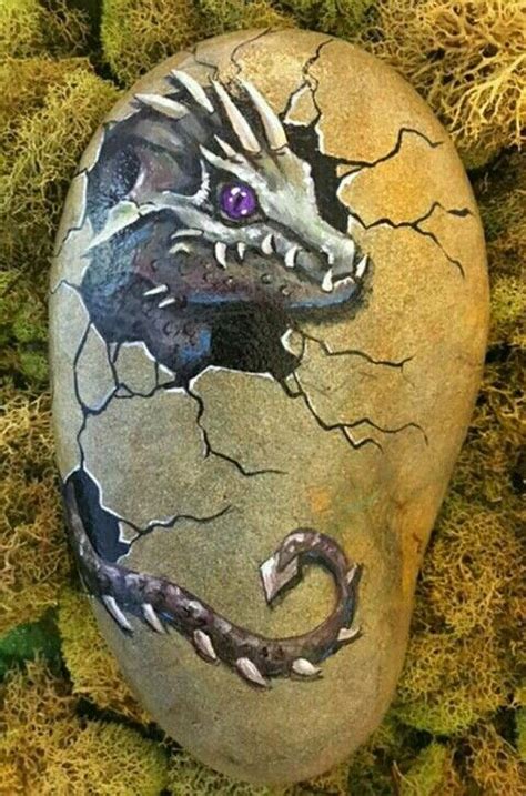 A Rock With A Dragon Painted On It