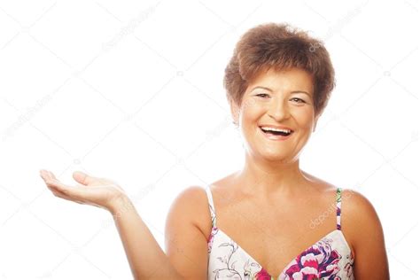 Mature Woman Stretching Her Hand On Wh Stock Photo Juice Team 30545201