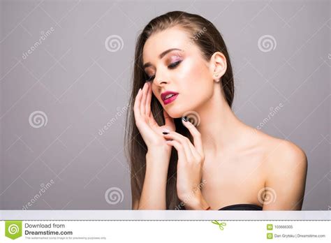 Pretty Girl With Big Eyes And Dark Eyebrows With Naked Shoulders