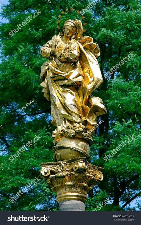Praying Madonna Golden Medieval Statue Front Stock Photo 666039835