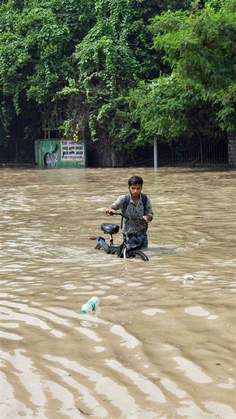 Delhi Floods Roads Submerged Houses Inundated And Traffic Affected