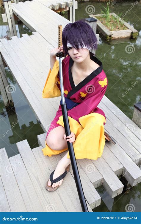 Japanese Cosplayer, A Female Samurai Editorial Photo | CartoonDealer ...