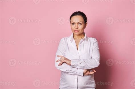 Confident Middle Aged Multi Ethnic Pregnant Woman In White Casual Shirt