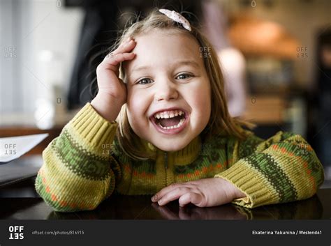 Portrait of laughing girl - Offset stock photo - OFFSET