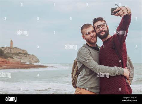 Spain Oropesa Del Mar Gay Couple Taking Selfie In Front Of The Sea Stock Photo Alamy