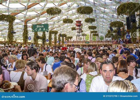 People Drink Beer in One of the Tents at the Oktoberfest in Munich ...