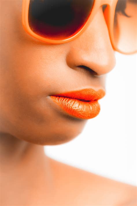 Free Photo Woman Wearing Orange Framed Sunglasses And Orange Lipstick Beautiful Nude Woman