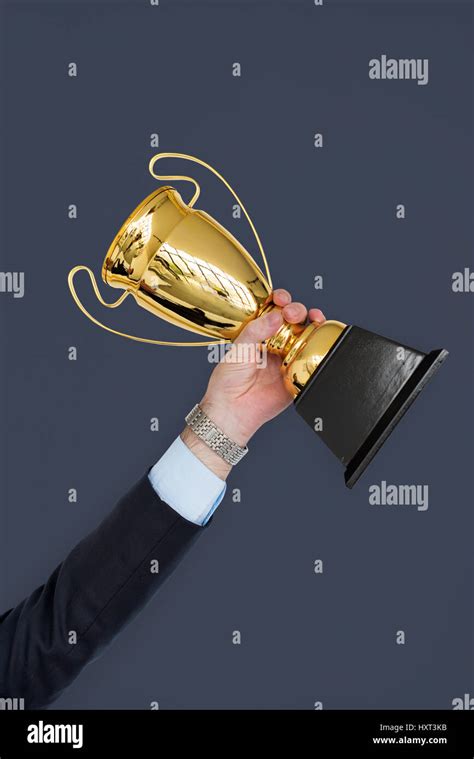 Man Holding Trophy Hi Res Stock Photography And Images Alamy
