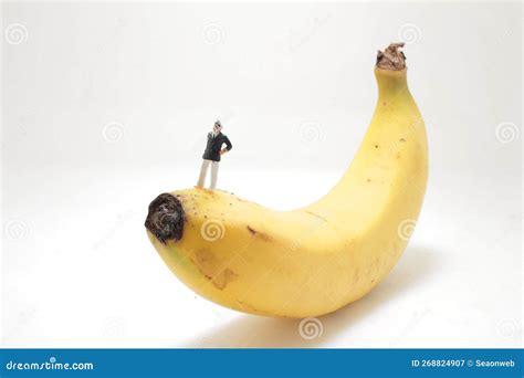 A Mini Of Figure Stand On The Banana Stock Image Image Of Snack