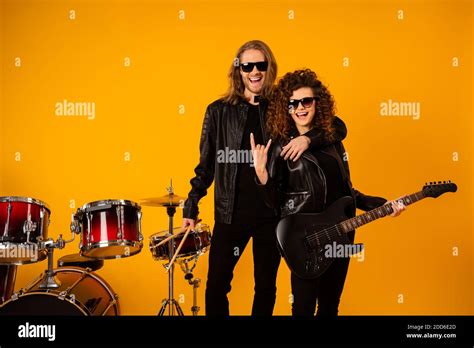 Positive Two People Popular Rock Band Man Hug Woman Hold Drumstick Bass