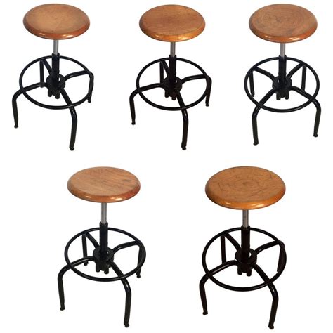 Black Metal And Chrome Bar Stools With Round Wood Seats Individually Priced For Sale At