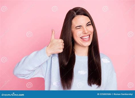 Photo Of Nice Optimistic Long Hairdo Brunette Lady Show Thumb Up Wink