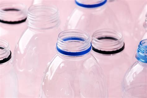 Premium Photo High Angle View Of Glass Bottles On Table