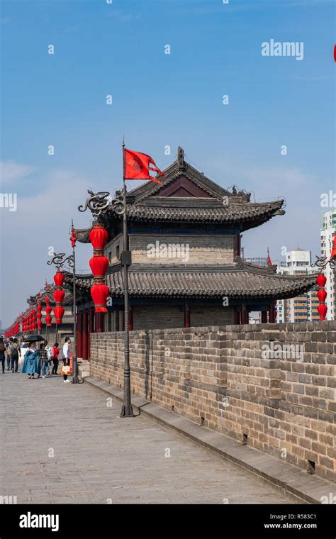 View Of Xian City Wall Ramparts With Modern City In Background Stock