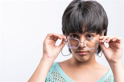 Premium Photo Closeup Portrait Of A Smiling Latina Woman With Glasses On White Background