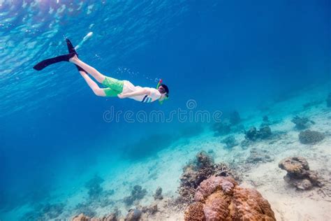 Boy swimming underwater stock image. Image of caucasian - 100496795