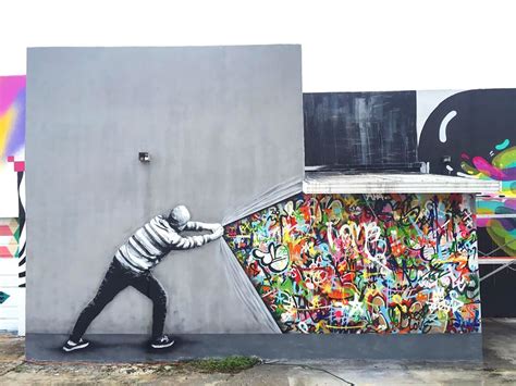 Greyscale Characters Interact With Vibrant Murals By Martin Whatson