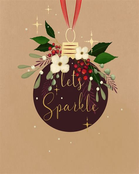 A Christmas Ornament With The Words Let S Sparkle In Gold And Red