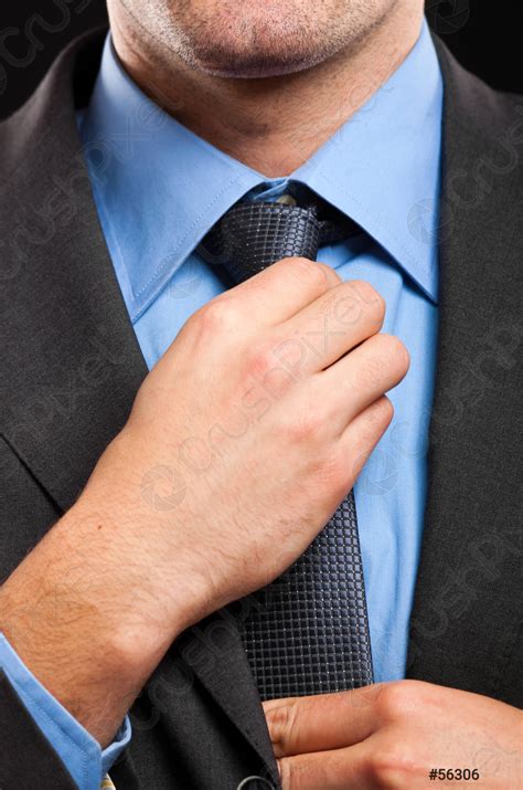 Man Adjusting His Tie Stock Photo 56306 Crushpixel