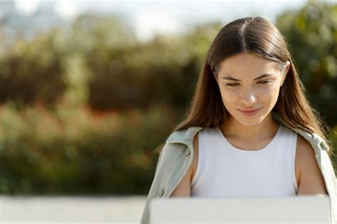 Premium Photo Pensive Woman Freelancer Using Laptop Computer Working