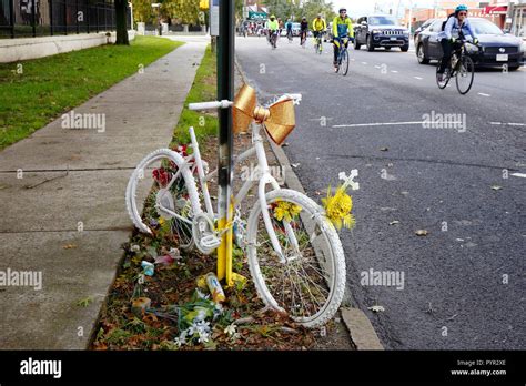 A Ghost Bike Memorial Marking The Death Of A Cyclist From A Traffic