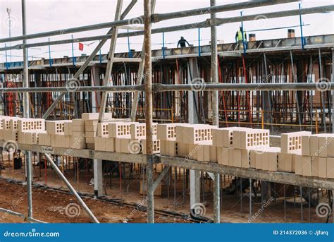 Bricks On Scaffolding Ready To Be Placed In Construction Site Stock