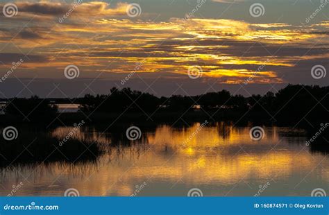 Beautiful Sunset Over The Swamp In Louisiana The Reflection Of Clouds In The Water Usa Stock