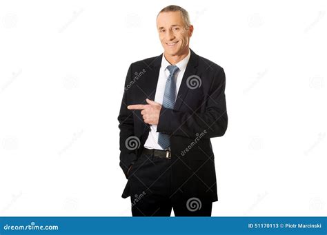 Mature Businessman Pointing To The Left Stock Image Image Of