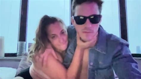 Sexy Police Officer Caught Naked At Window In Uniform Shorts Black Hair And Perky Breasts