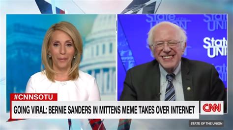 This Clip Of Bernie Sanders Grinning At His Meme Is Wholesome Viewing