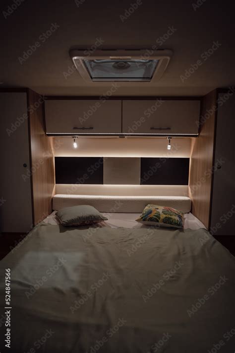 Bed inside a new luxury camper van motorhome Stock Photo | Adobe Stock