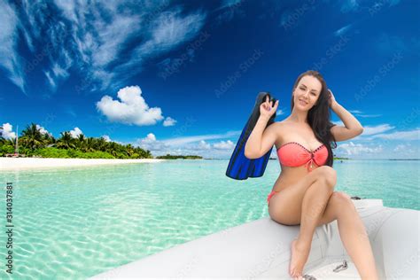 Brunette Girl In Bikini On Boat In View Of Paradise Tropic Beach