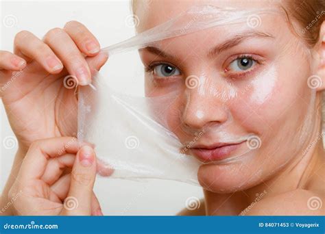 Woman Removing Facial Peel Off Mask Stock Image Image Of Applying