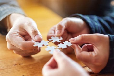 Premium Photo Closeup Image Of A Group Of People Holding And Putting