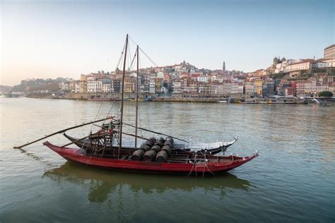 Premium Photo Traditional Rabelo Boat With Wine Barrels At Douro