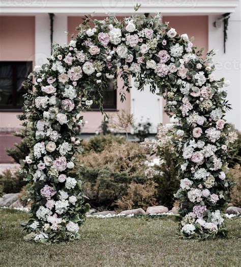 Beautiful wedding arch with flowers 20105222 Stock Photo at Vecteezy