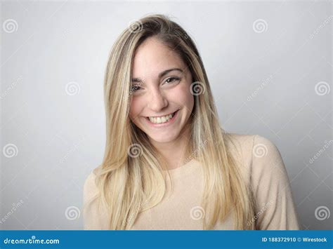 Smiling Blonde Woman Behind A White Background Stock Photo Image Of Cute Hair