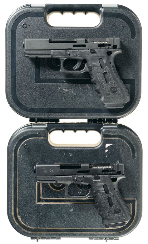 Two Glock Semi Automatic Cutaway Pistols W Cases Rock Island Auction