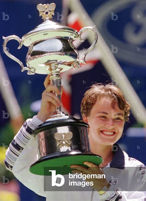 Image Of Martina Hingis Of Switzerland Holds The Australian Open Trophy