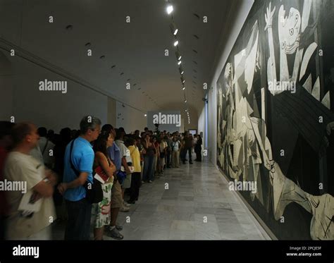 A Large Crowd Of Visitors Looks At Spanish Artist Pablo Picasso S World