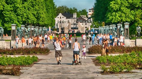 Oslo Jun Tourists Enjoy City Streets On A Sunny Day June