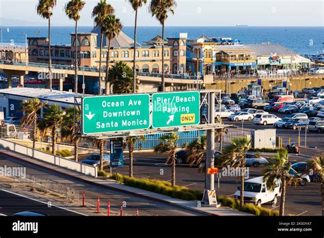 Overhead Road Direction Signs To Ocean Ave The Beach And Pier And