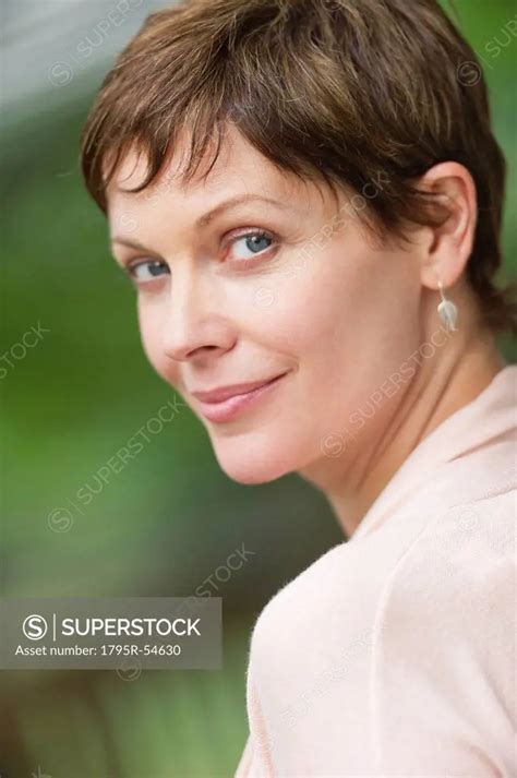 Portrait Of Mature Woman Smiling SuperStock