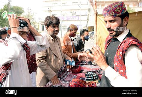 People Purchase Sindh Topi And Ajrak Sindh Traditional Dresses To